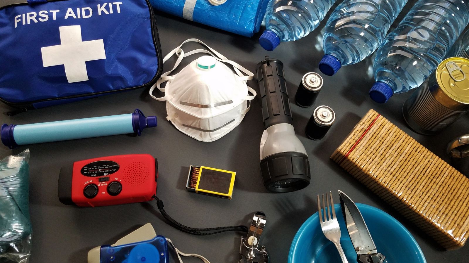 First aid kit, flashlight, masks, and other items for disaster preparedness